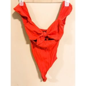 Red body suit from Urban Outfitters